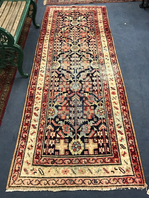 A Malayer carpet 295 x 100cm